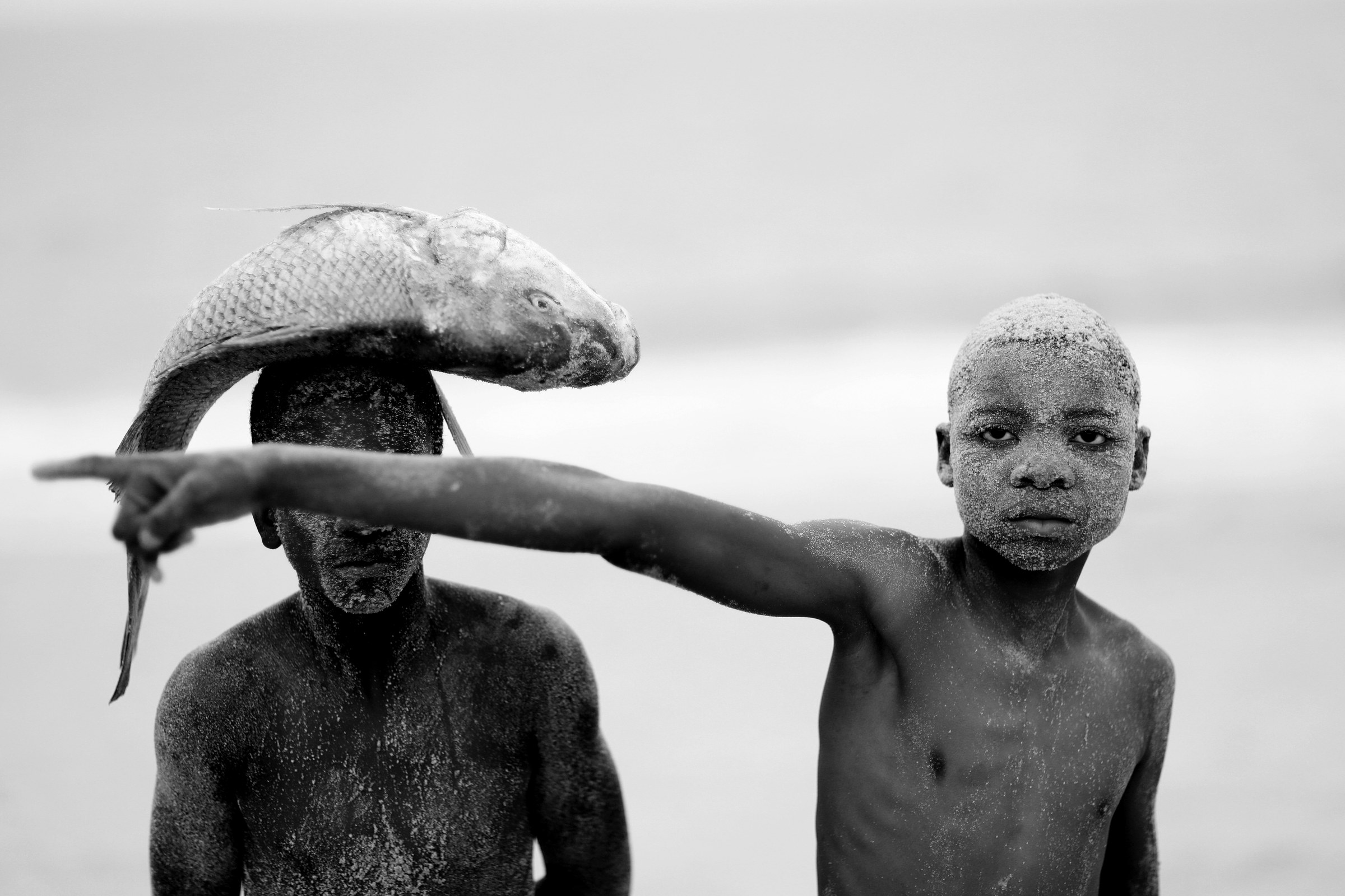 Mario Macilau, Two Boys with a Fish, Faith series, 2018